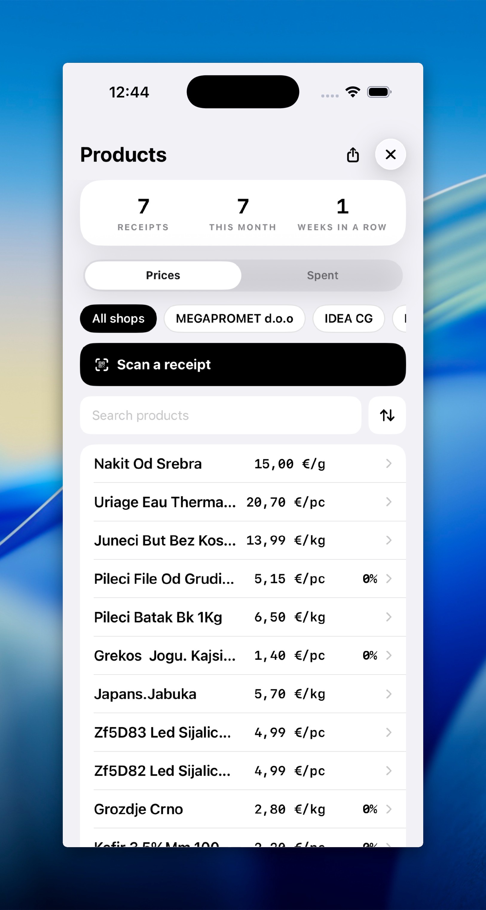 Products: every product you’ve bought with its unit price, its trend, the shop and date, and a Scan a receipt button.
